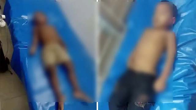 উদ্ধারের পরে মৃত দুই চাচাতো ভাইয়ের মরদেহ।